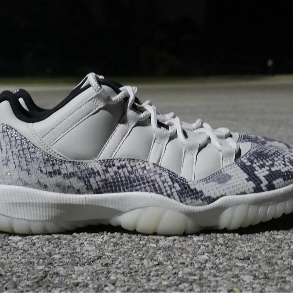 The Air Jordan 11 Low LE “Snakeskin” sz 11.5
